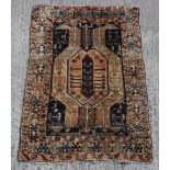 Property of a deceased estate - a modern Persian woollen hand knotted rug, with navy field, 66 by
