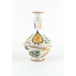 A Turkish Ottoman Kutahya pottery wine flagon, painted with stylised leaves, 8.35ins. (21.2cms.)