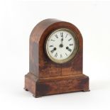 Property of a deceased estate - a late 19th century walnut arched cased mantel clock with German