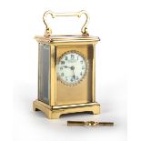 Property of a lady - a late 19th / early 20th century French brass cased carriage clock timepiece,