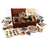 Property of a lady - a leather box containing assorted buttons including sets, the box 14.75ins. (