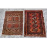 Property of a gentleman - two Belouch rugs, 60 by 42ins. (153 by 107cms.) and 54 by 41ins. (138 by