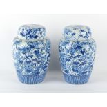 Property of a lady - a pair of late 19th century Japanese Arita blue & white jars & covers, with