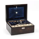 The Henry & Tricia Byrom Collection - a Victorian coromandel veneered sewing box with mother-of-