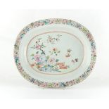 Property of a deceased estate - an 18th century Chinese famille rose oval serving dish, painted with