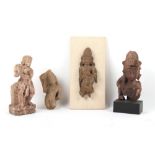 Property of a deceased estate - an antique Indian carved wood figure of a deity, 11.8ins. (30cms.)