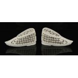 A pair of Chinese biscuit porcelain perfumieres modelled as shoes, each 4.4ins. (11.1cms.) long (2).