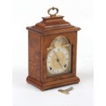 Property of a deceased estate - a burr & figured walnut cased bracket clock by Elliott, the two