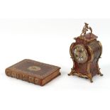 Property of a lady - a late 19th century French gilt metal mounted Boulle style mantel clock, the