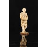 Property of a lady - a Japanese carved ivory okimono by Masamune depicting a man carrying a fish