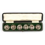 The Henry & Tricia Byrom Collection - an Edwardian cased set of six silver buttons, of pierced