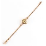 Property of a deceased estate - a lady's Camerer Cuss 9ct gold cased wristwatch on 9ct gold bracelet