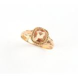 A Victorian yellow gold topaz ring, the cushion cut topaz weighing approximately 1.36 carats, size