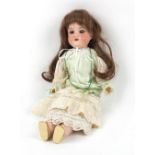 Property of a gentleman - an Armand Marseille bisque headed doll with sleeping eyes and open