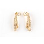 A large pair of modern unmarked high carat yellow gold diamond earrings, set with 212 round cut