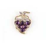An unmarked yellow & white gold (tests 14ct) amethyst & diamond brooch modelled as fruit, with six