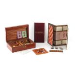 The Henry & Tricia Byrom Collection - an early 20th century mahogany cased games compendium, the