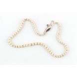 An unusual opal split bead necklace, with sapphire & diamond clasp, 17.25ins. (44cms.) long.