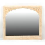 Property of a deceased estate - a modern Gothic style composite stone framed wall mirror, 32 by 36.