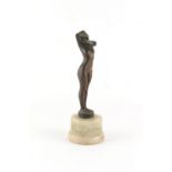 Property of a deceased estate - an Art Deco patinated bronze figure of a standing female nude,