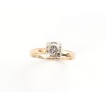 Property of a gentleman - a 14ct yellow gold diamond single stone ring, the round brilliant cut