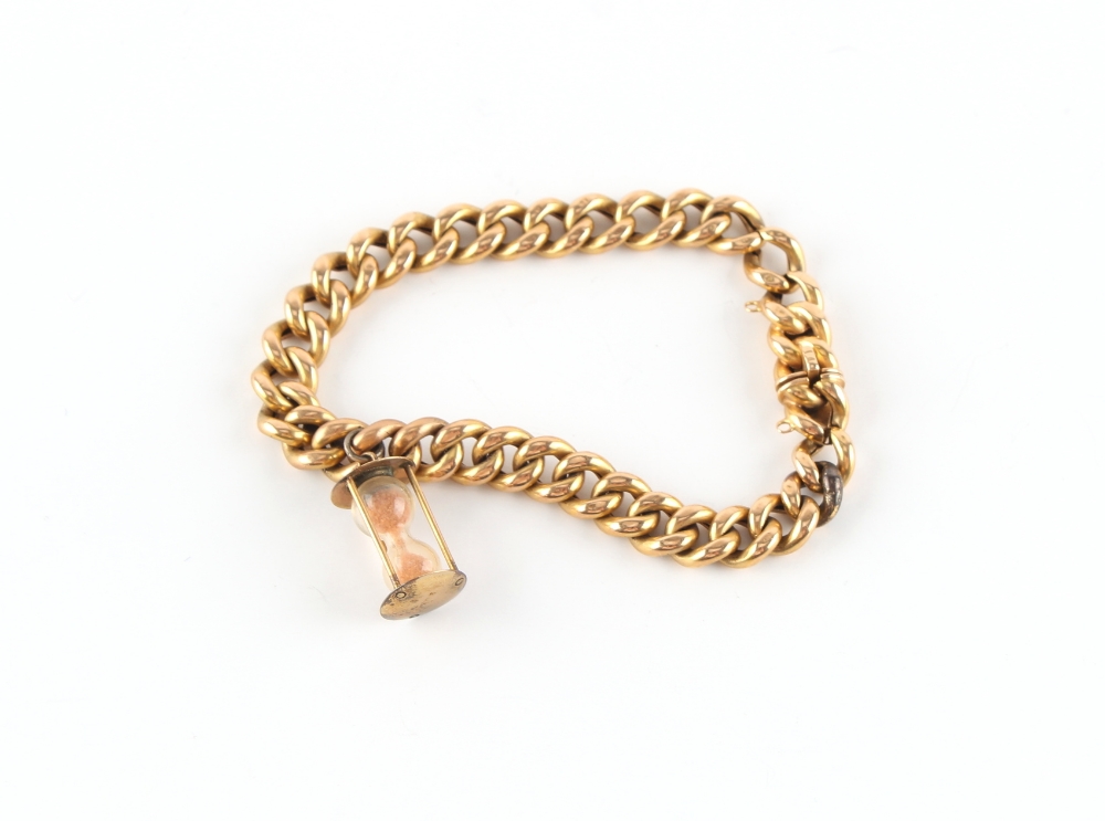 Property of a deceased estate - a 15ct gold chain link bracelet, with 9ct gold hour glass charm,