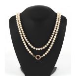 Property of a deceased estate - a cultured pearl double length necklace, the one hundred & thirty-