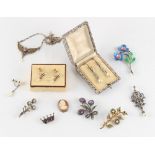Property of a lady - a bag containing assorted costume jewellery including a plique a jour butterfly