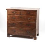 Property of a gentleman - a George III oak chest of two short & three long graduated drawers, 38ins.