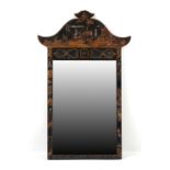 Property of a deceased estate - a black chinoiserie decorated wall mirror, 37ins. (94cms.) high.
