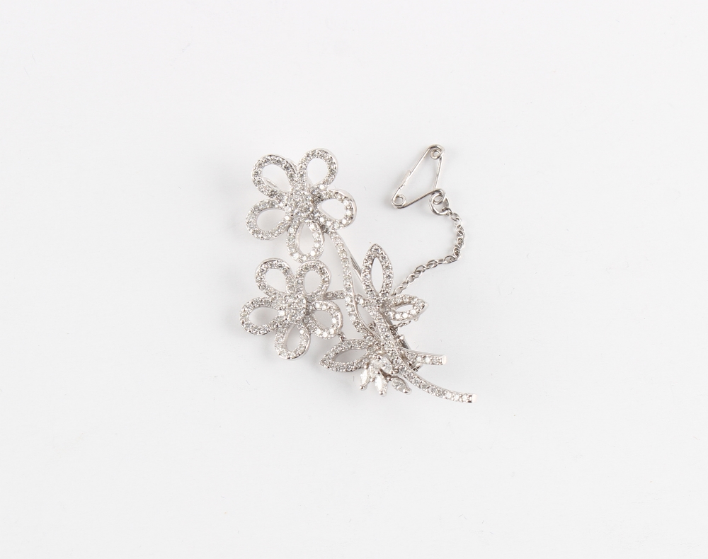 Property of a deceased estate - an 18ct white gold double flowerhead spray brooch, with marquise cut - Image 2 of 2