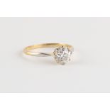 An 18ct yellow gold diamond single stone ring, the round brilliant cut diamond weighing an estimated