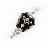 An early 20th century Belle Epoque diamond & black onyx pendant, 47mm long.