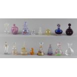 Property of a deceased estate - a collection of sixteen perfume or scent bottles, all but one glass,