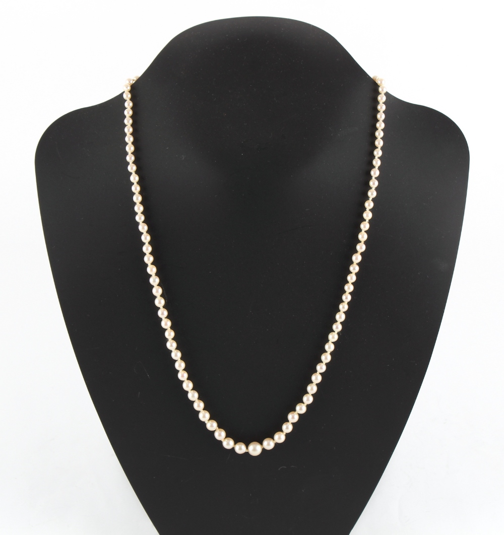 Property of a lady - a cultured pearl graduated single strand necklace, the largest pearl