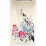 An unframed Chinese embroidered silk panel depicting two cranes among rockwork & flowers,