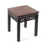 A late 19th century Chinese hongmu table with carved frieze, 17.75 by 17.5ins. (45 by 44.5cms.).