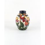 Property of a deceased estate - a Moorcroft Hellebore at Christmas pattern vase, designed by