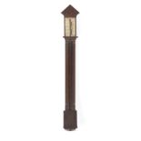 Property of a gentleman - a George III mahogany stick barometer with architectural pediment & reeded