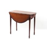 Property of a gentleman - a George III mahogany & crossbanded oval topped pembroke table, with end