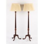 Property of a gentleman - a pair of tripod standard lamps, with shades (2).