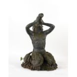 Property of a gentleman - a weathered bronze fountain head modelled as a triton, 37.5ins. (95cms.)