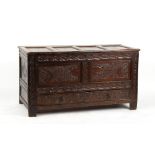 Property of a lady - an early 18th century later carved oak mule chest, 52.75ins. (134cms.) wide (