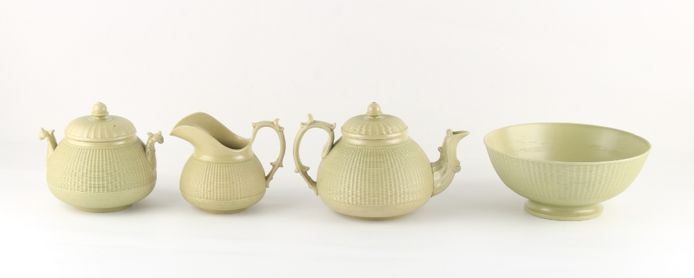 Property of a lady - a Hackwood olive green stoneware four piece tea set with finely moulded cane