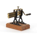 The Henry & Tricia Byrom Collection - a Victorian brass & cast iron crimping machine, 11ins. (