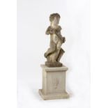 Property of a gentleman - a well weathered reconstituted stone figure of a cherub on associated