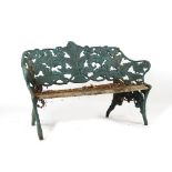 Property of a gentleman - a green painted cast iron fern pattern garden bench, in the style of