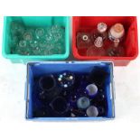 Property of a lady - three boxes containing assorted glassware including blue glass jugs (3).