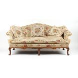 Property of a gentleman - an early 20th century carved walnut & floral upholstered sofa, in the