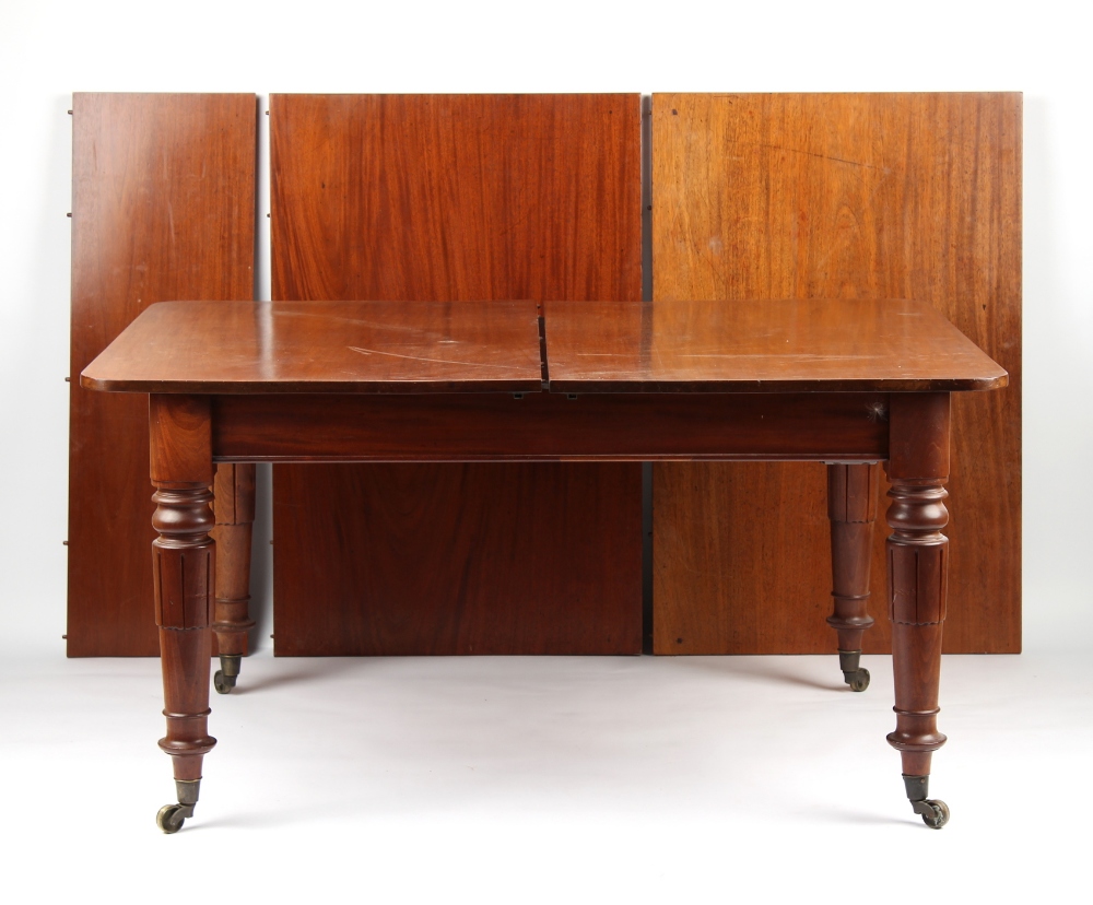 Property of a gentleman - a Victorian mahogany telescopic extending dining table with three extra